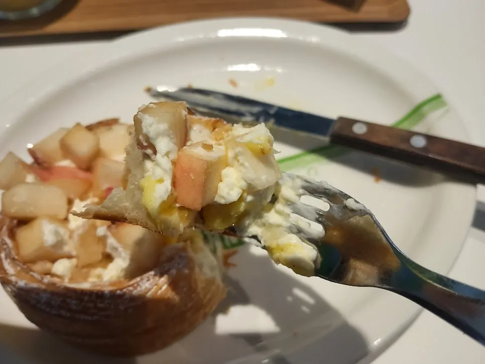 Pastry plate topped with fruit and cream