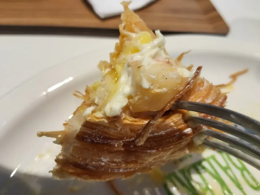 Close-up of cream and fruit combined on the dessert
