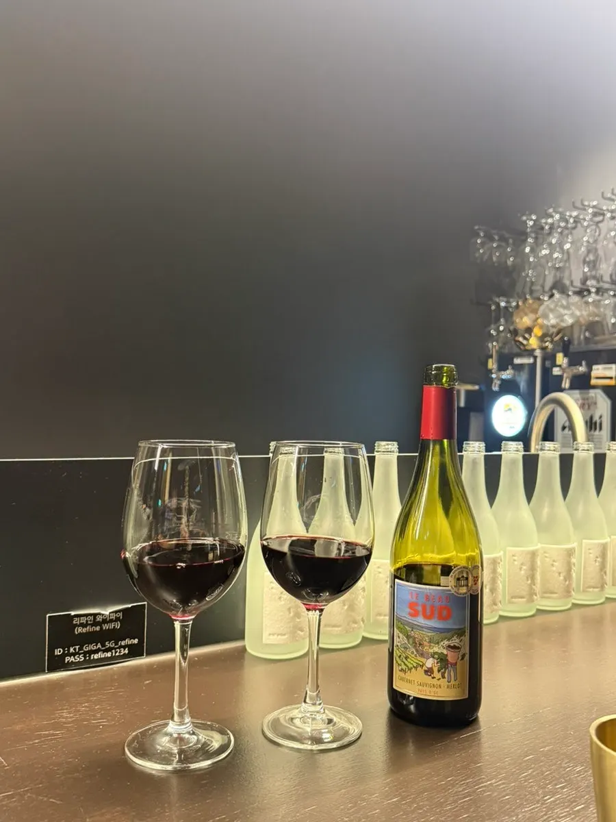 Wine set up on the softly lit bar table