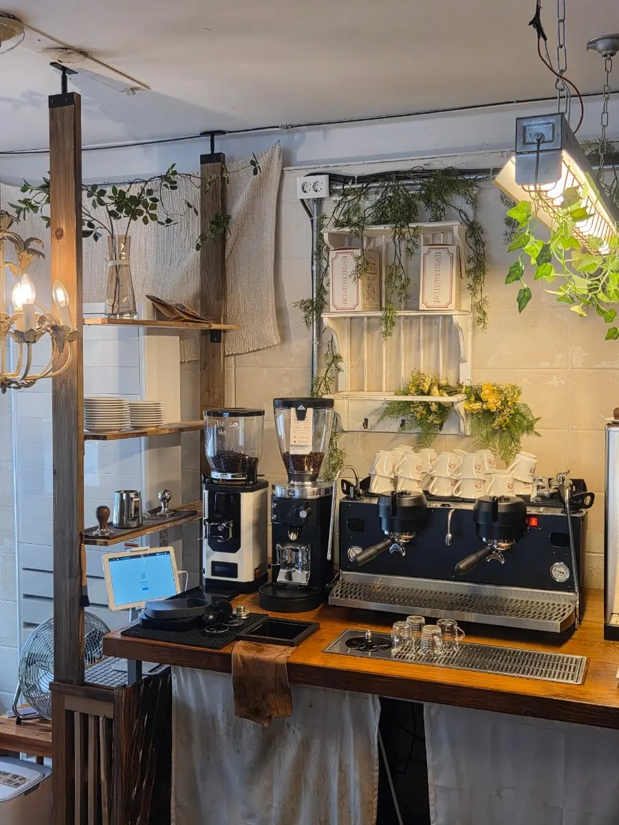 Café interior with white walls and wood furniture