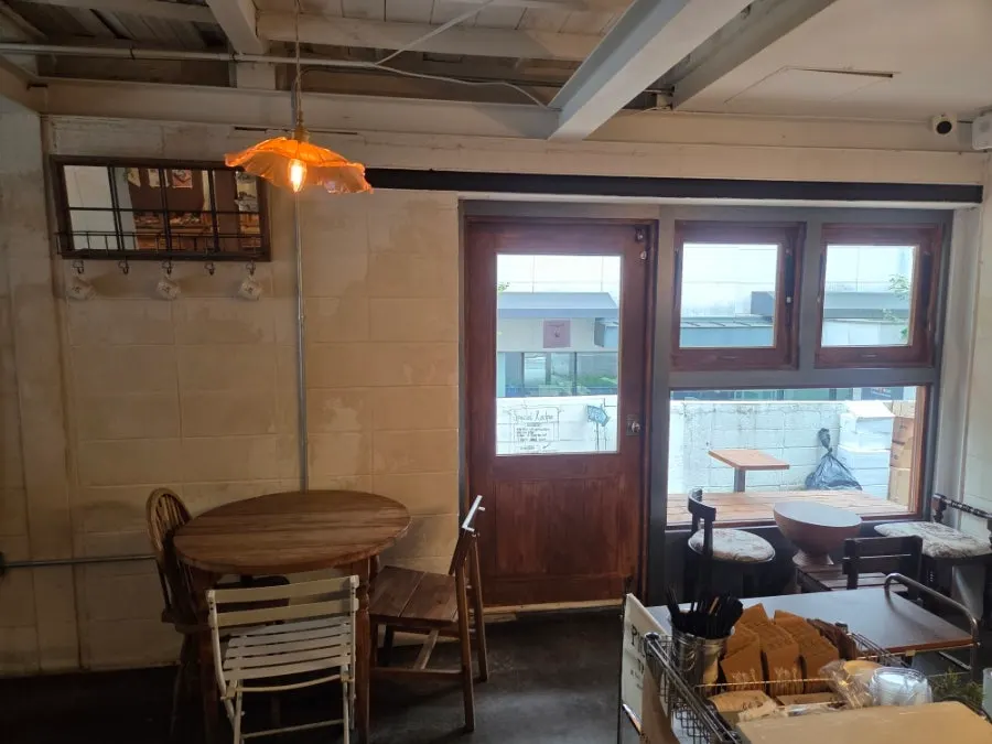 Quiet 2nd-floor seating with a window bar table