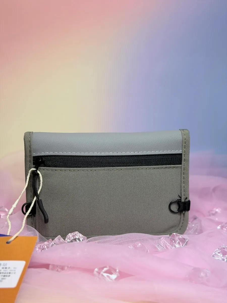 Passport bag with separate storage for belongings