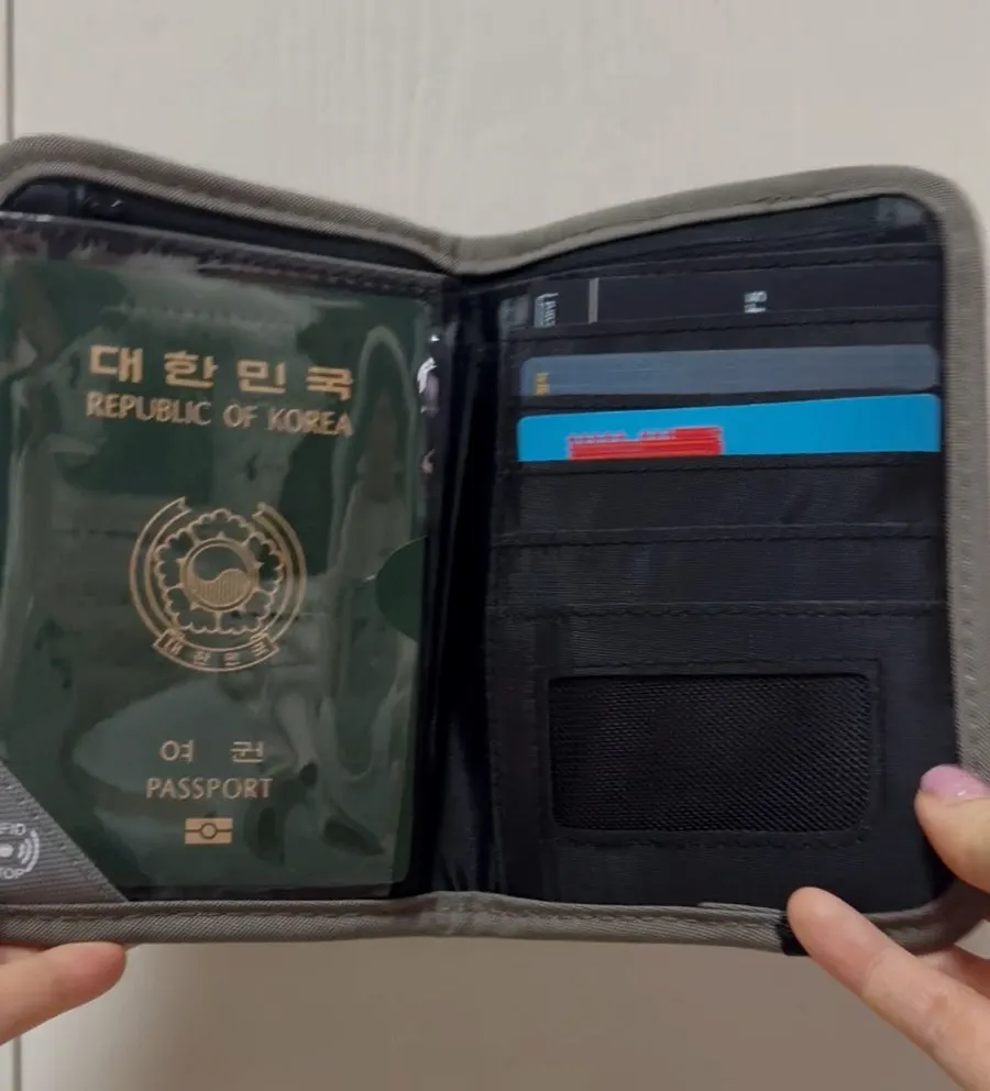Passport bag for keeping belongings together at the airport and hotel