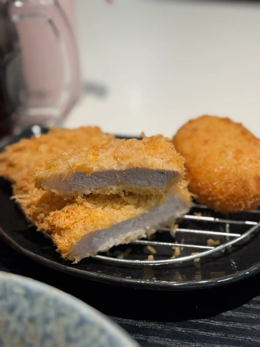 Cross-section of the tenderloin cutlet showing crisp breading