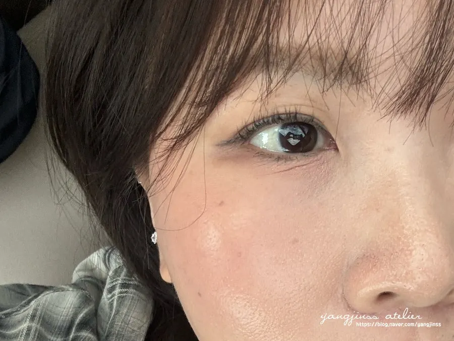 Side view of lashes lifted from the root
