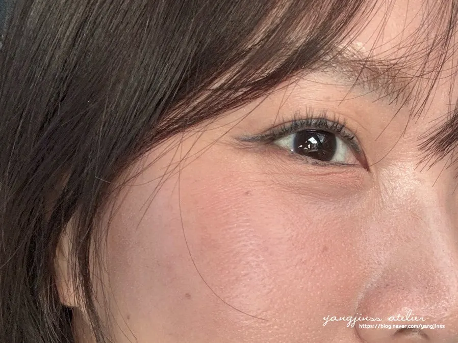 Close-up of softly curled lashes