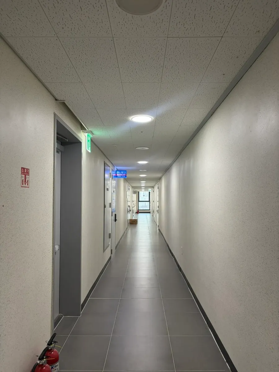 Office building elevator entrance next to Woojicoffee
