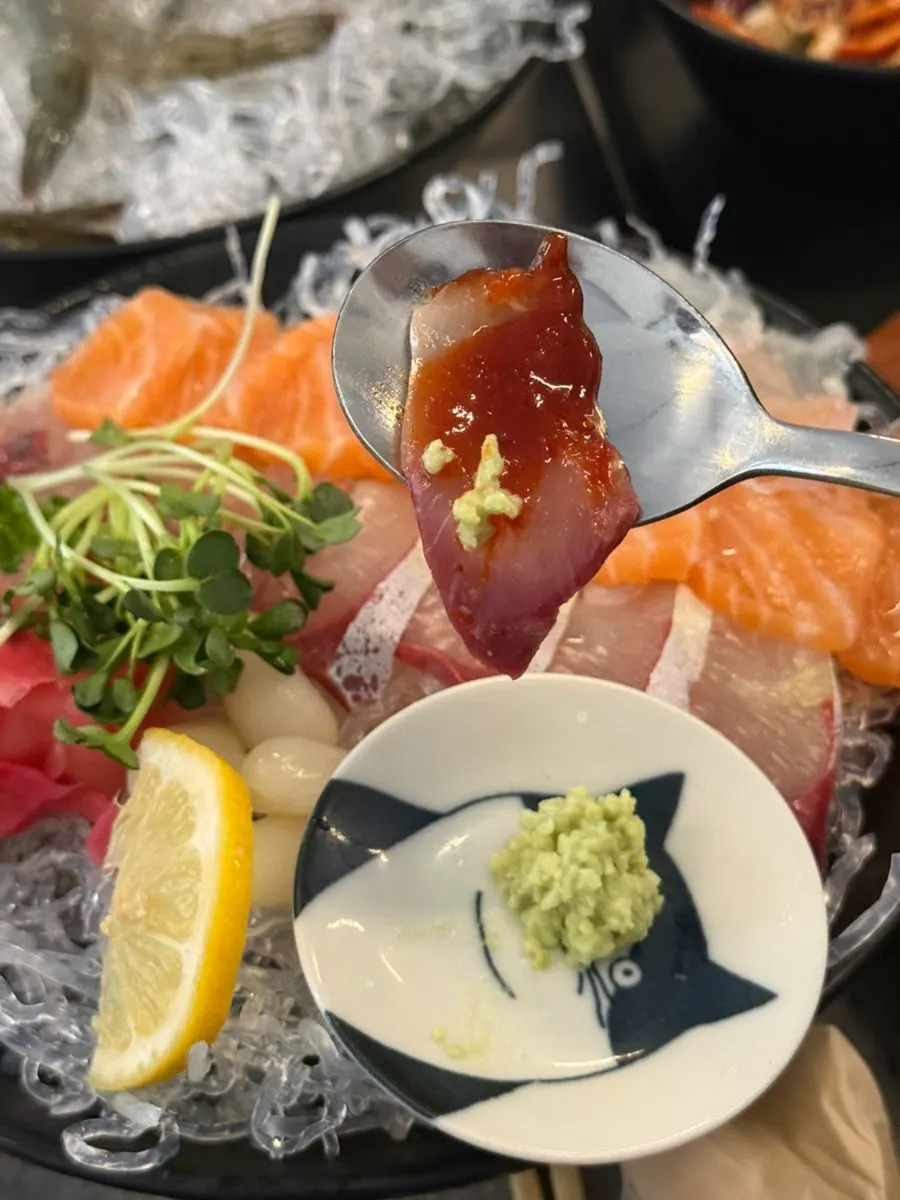 Aged assorted sashimi dipped in chojang sauce