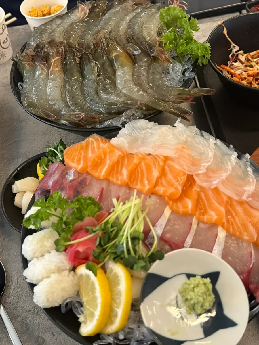 A plate of live shrimp sashimi still moving