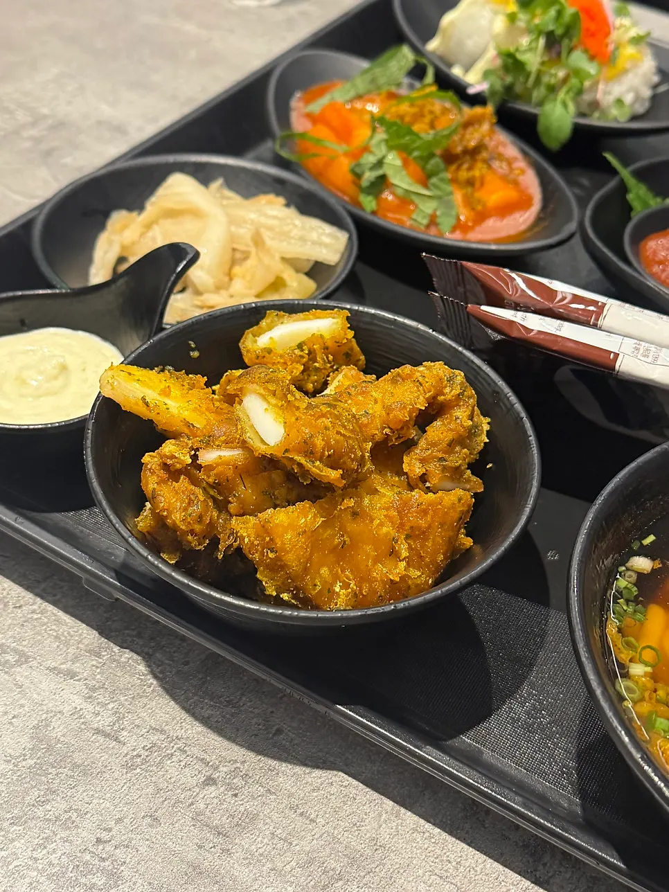 Plate of fried squid and sweet potato