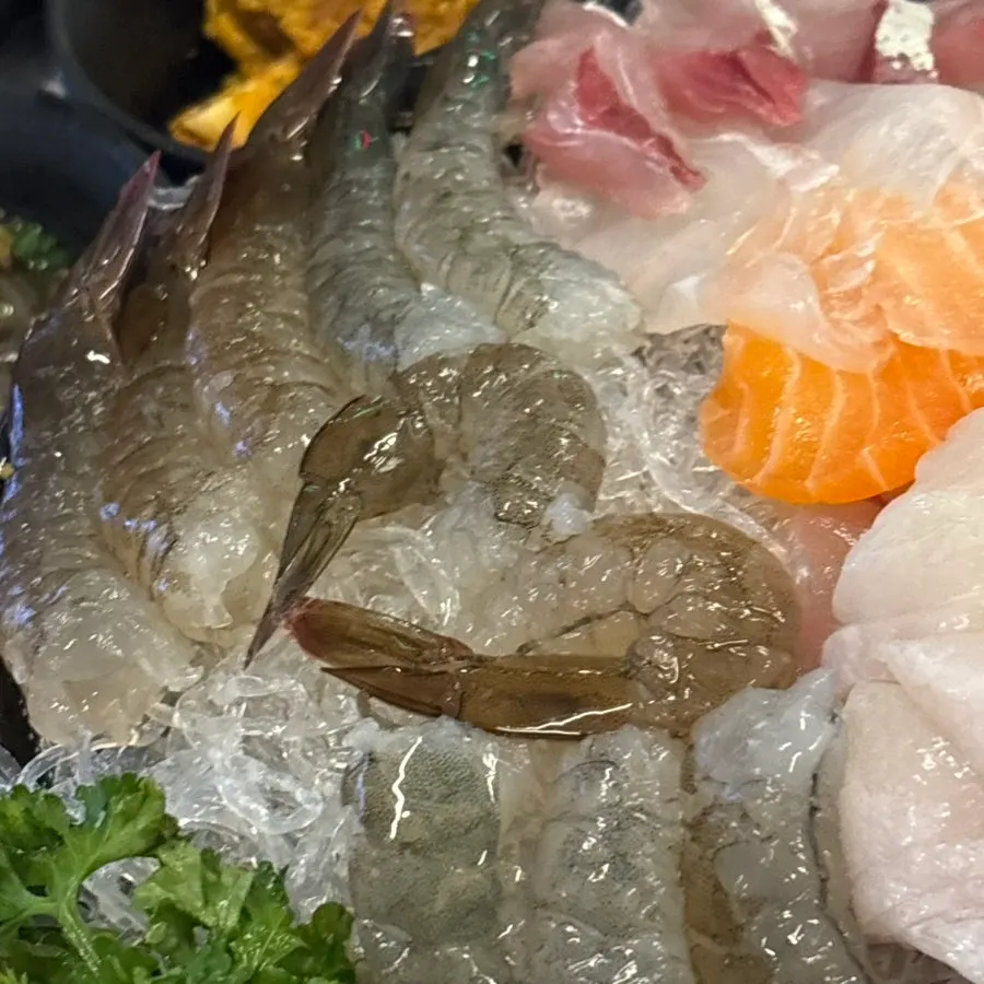 Plate of peeled raw shrimp