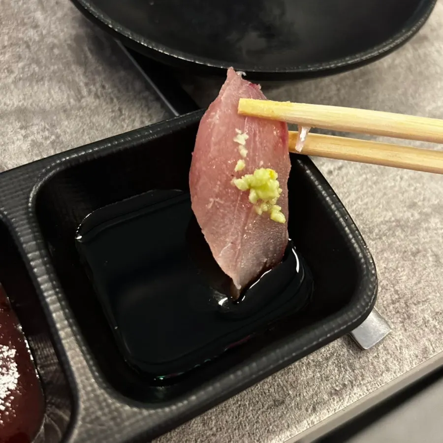 Aged mixed sashimi plate with amberjack, salmon, and flatfish