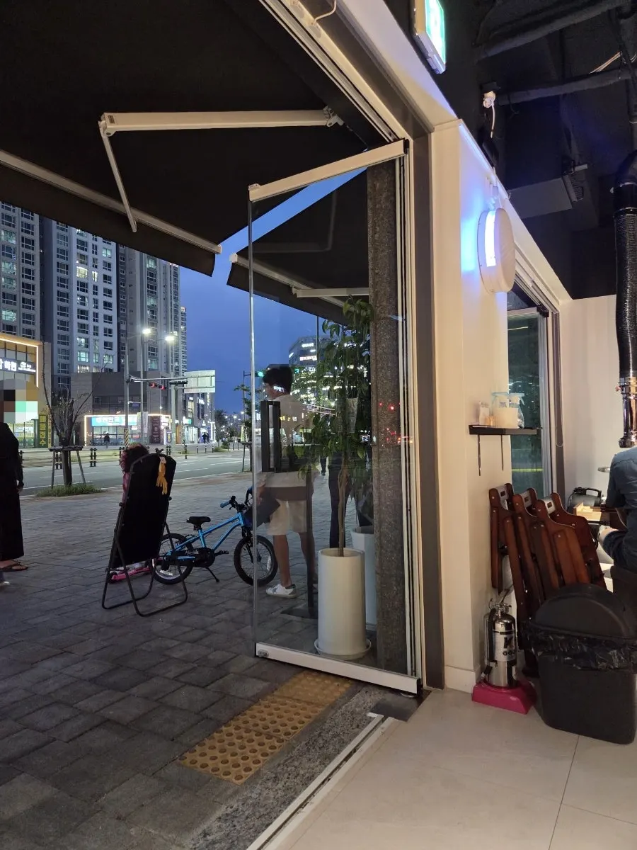 Open-air style seating at Risan with wide table spacing