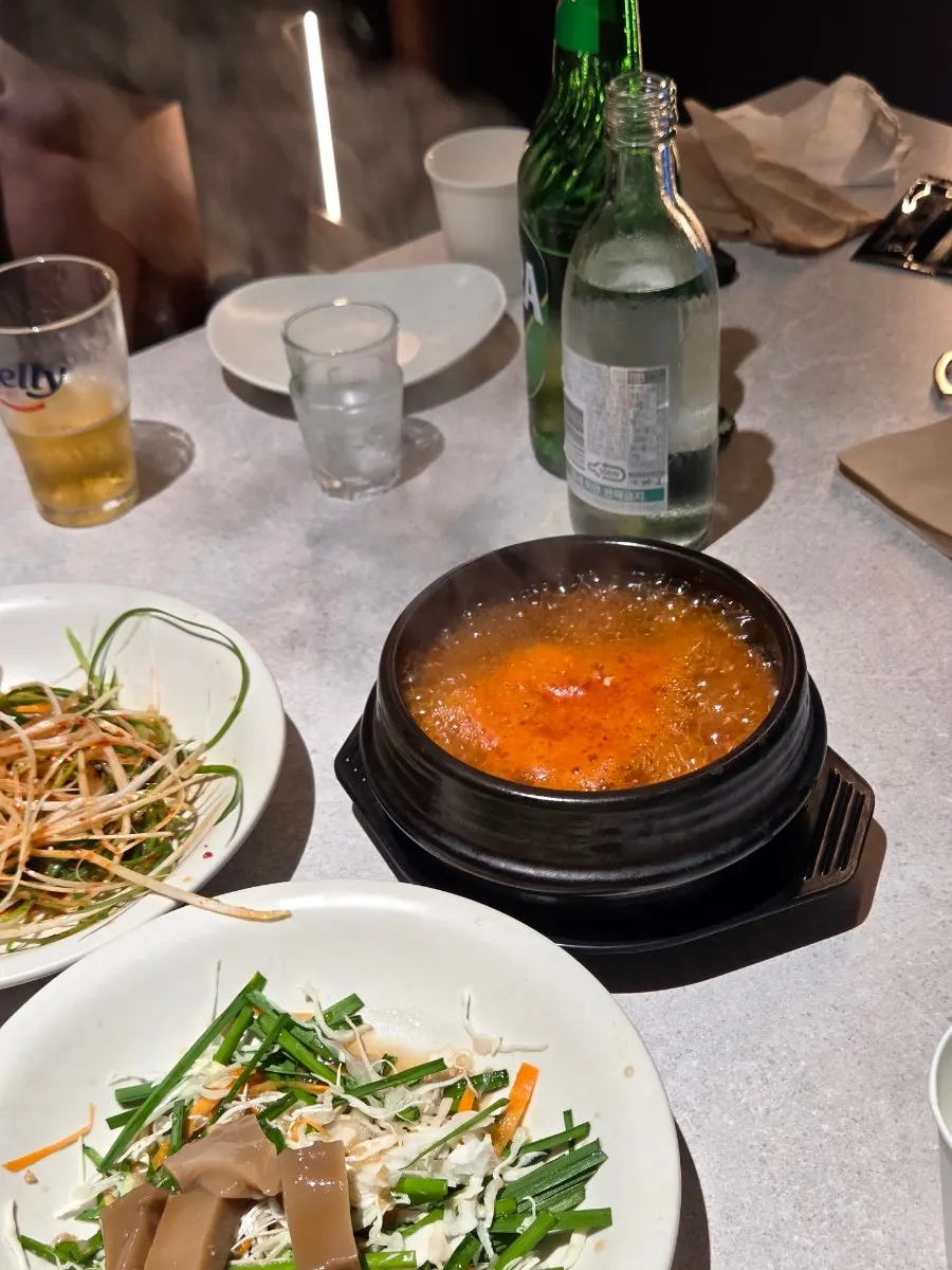 More side dishes continually being set down at Risan