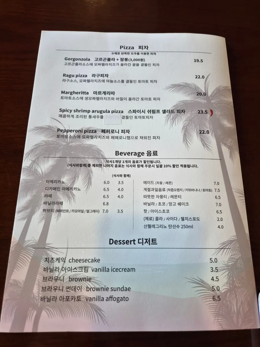 Riverside menu board listing pasta and steak