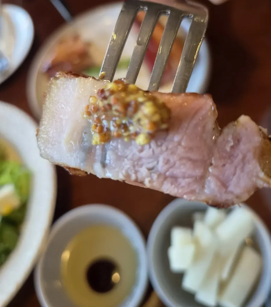 Thick-cut bacon topped with wholegrain mustard