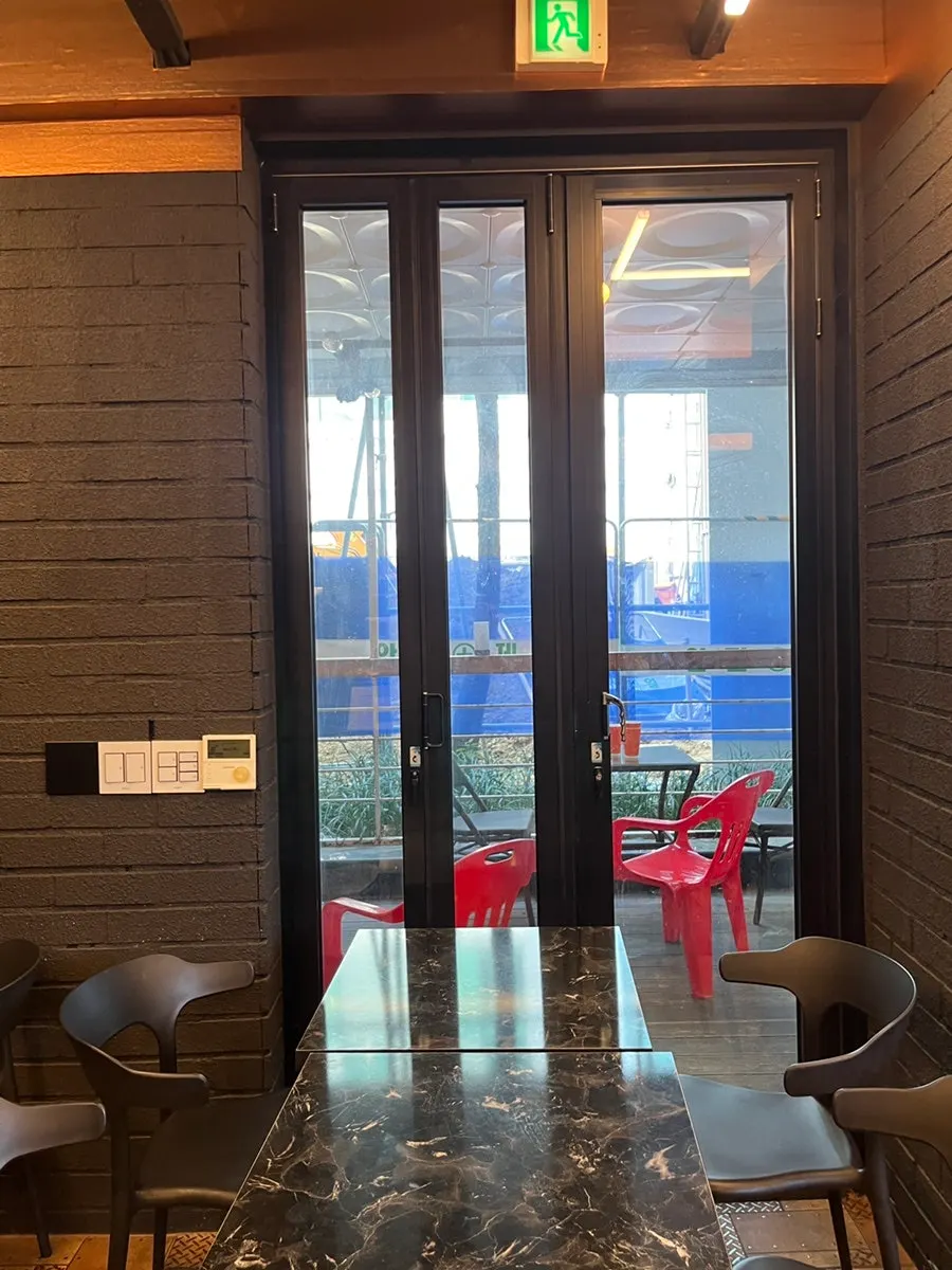 Seating area at Roastery Stan Yeoksam Main