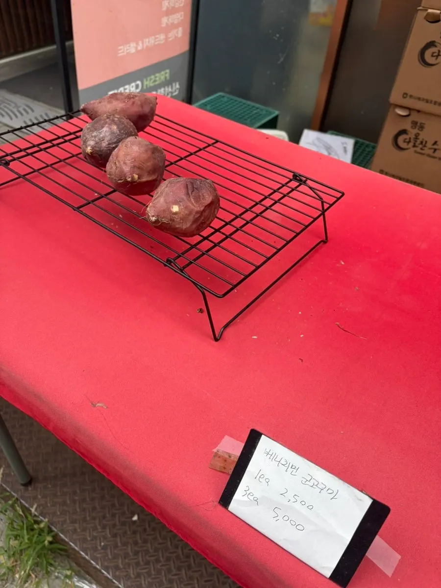 Sandwiches and drinks displayed in front of the shop