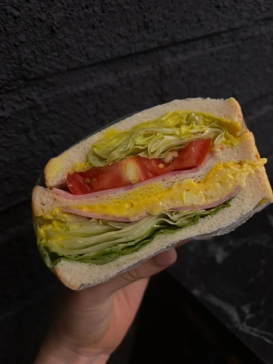 Large club sandwich cut into two pieces