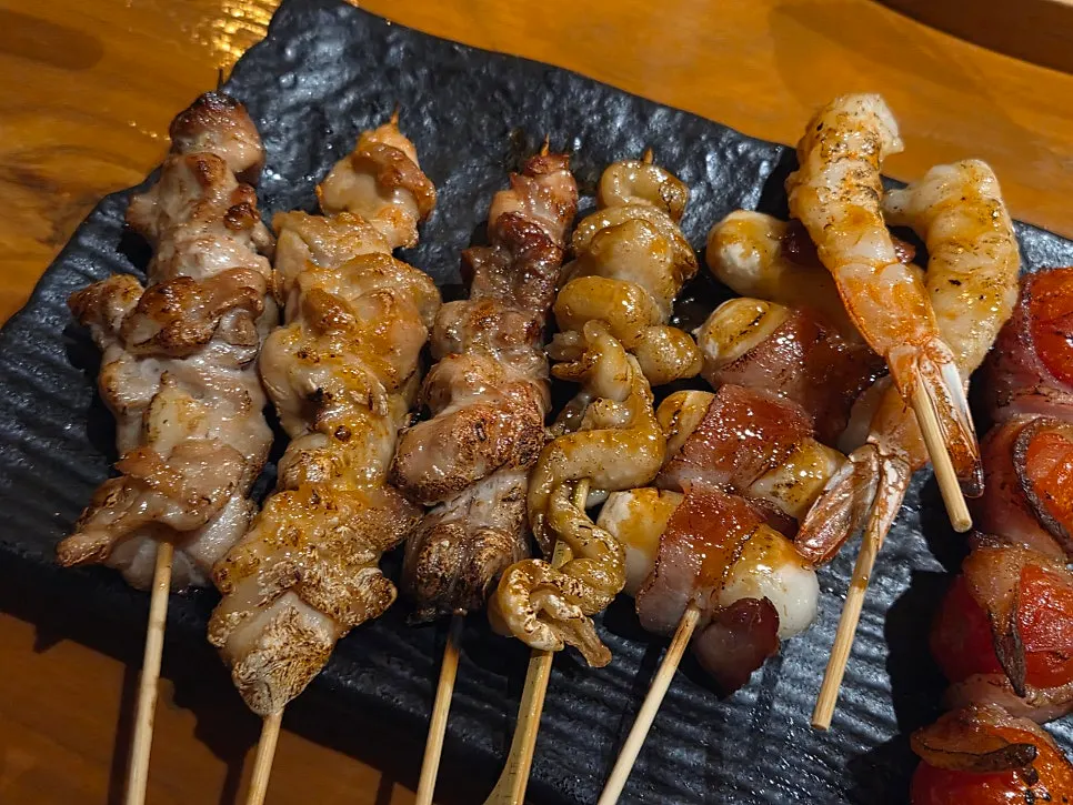 Mixed skewers with chicken, vegetables, and shrimp