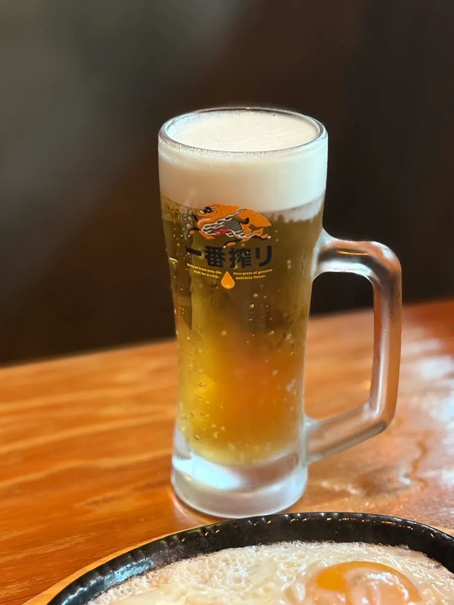 A glass of Kirin draft beer priced at ₩7,000