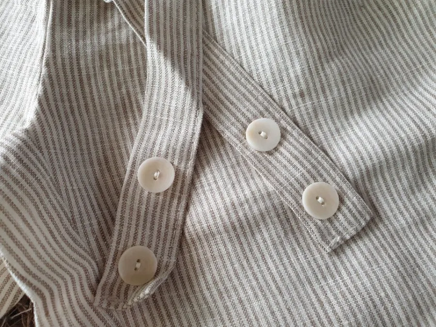 Back waistband and cutout detail of the overalls