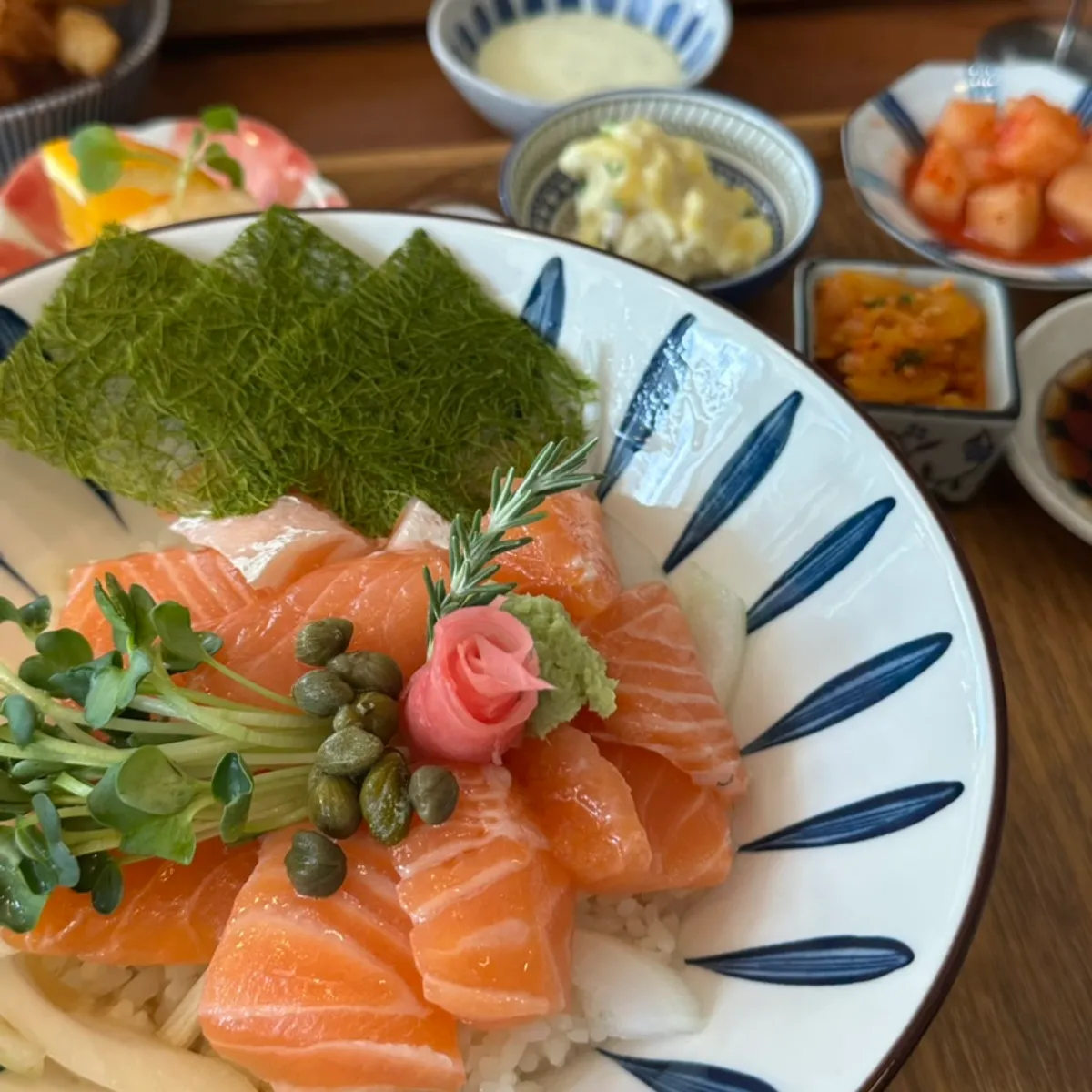 Close-up of salmon on the herb-aged salmon rice bowl