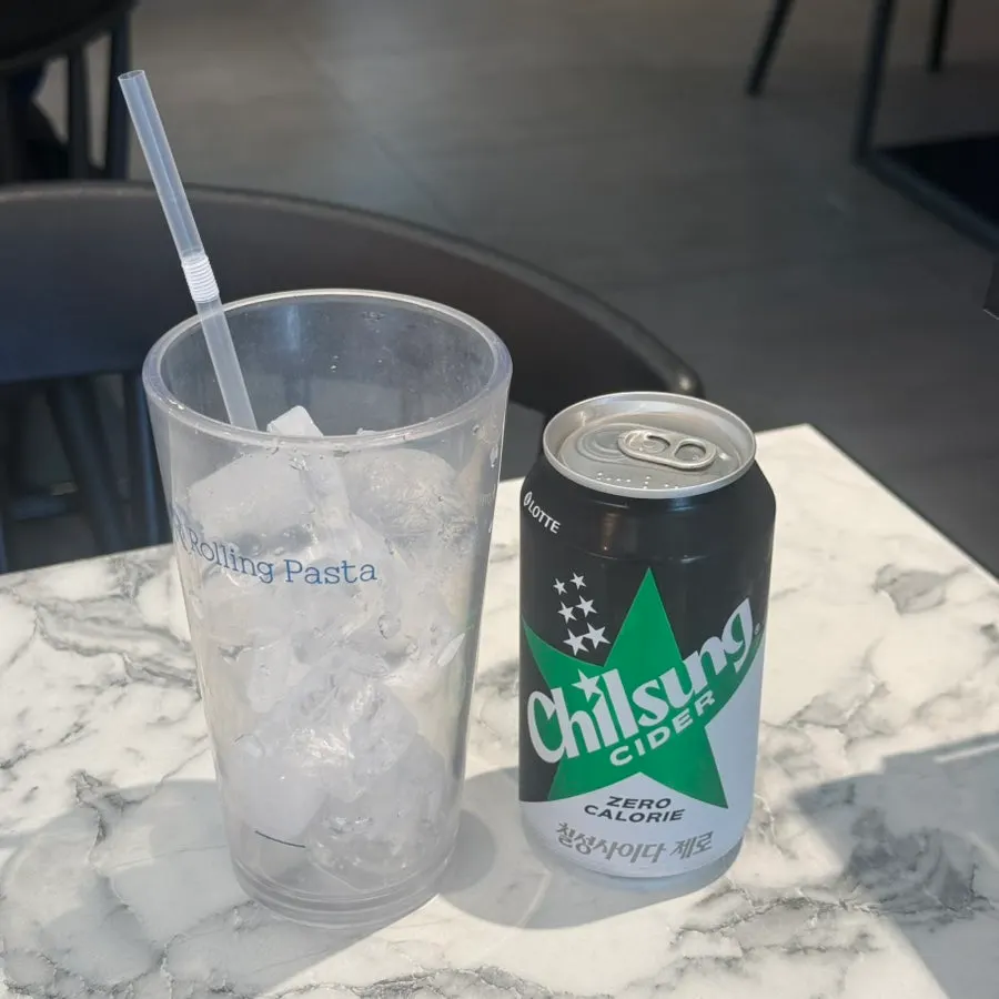 Drink served with a cup of ice