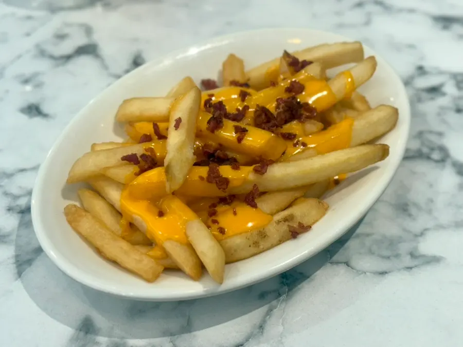 The additional order of bacon cheese fries