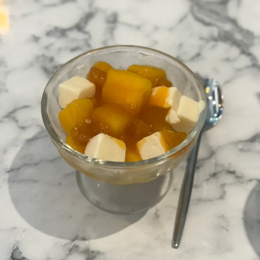 Ice cube mango cheese dessert ordered for the end of the meal