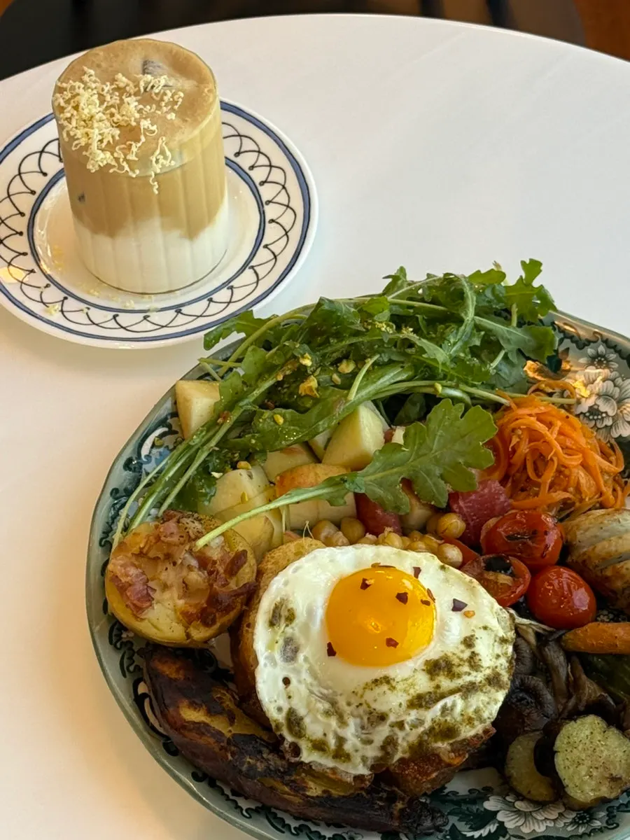 Brunch and coffee set at a window table