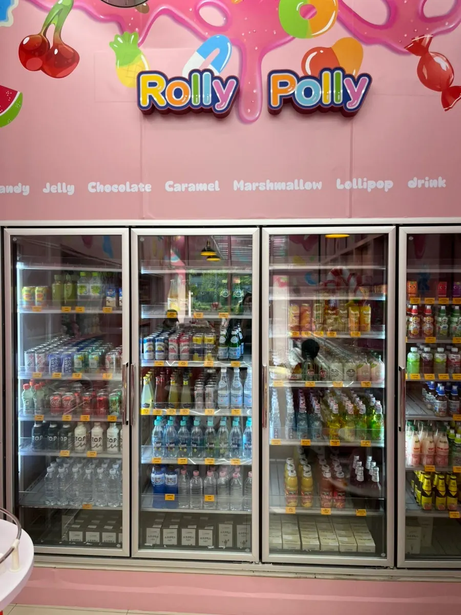 Container filled with star candy and rainbow-colored candies