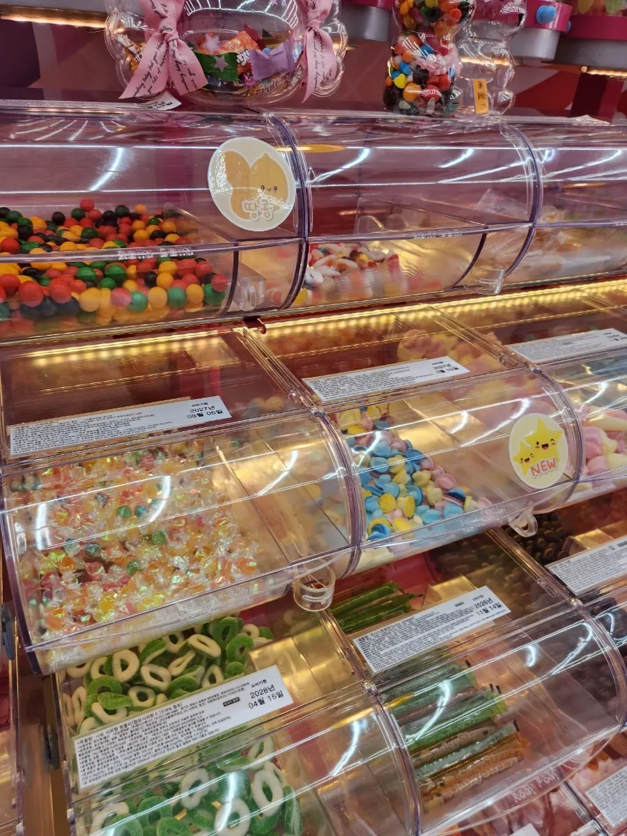 View of the aisle and jelly corner inside the shop