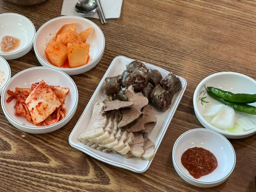 Plate of boiled pork, blood sausage, and liver from the set meal