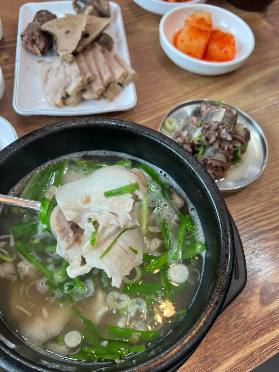 Blood sausage and meat inside the clear blood sausage soup