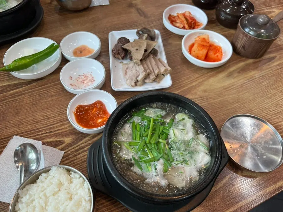 Full spread of the blood sausage soup set meal