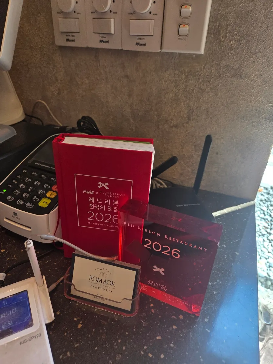 Red Ribbon National Best Restaurants 2026 selection sign