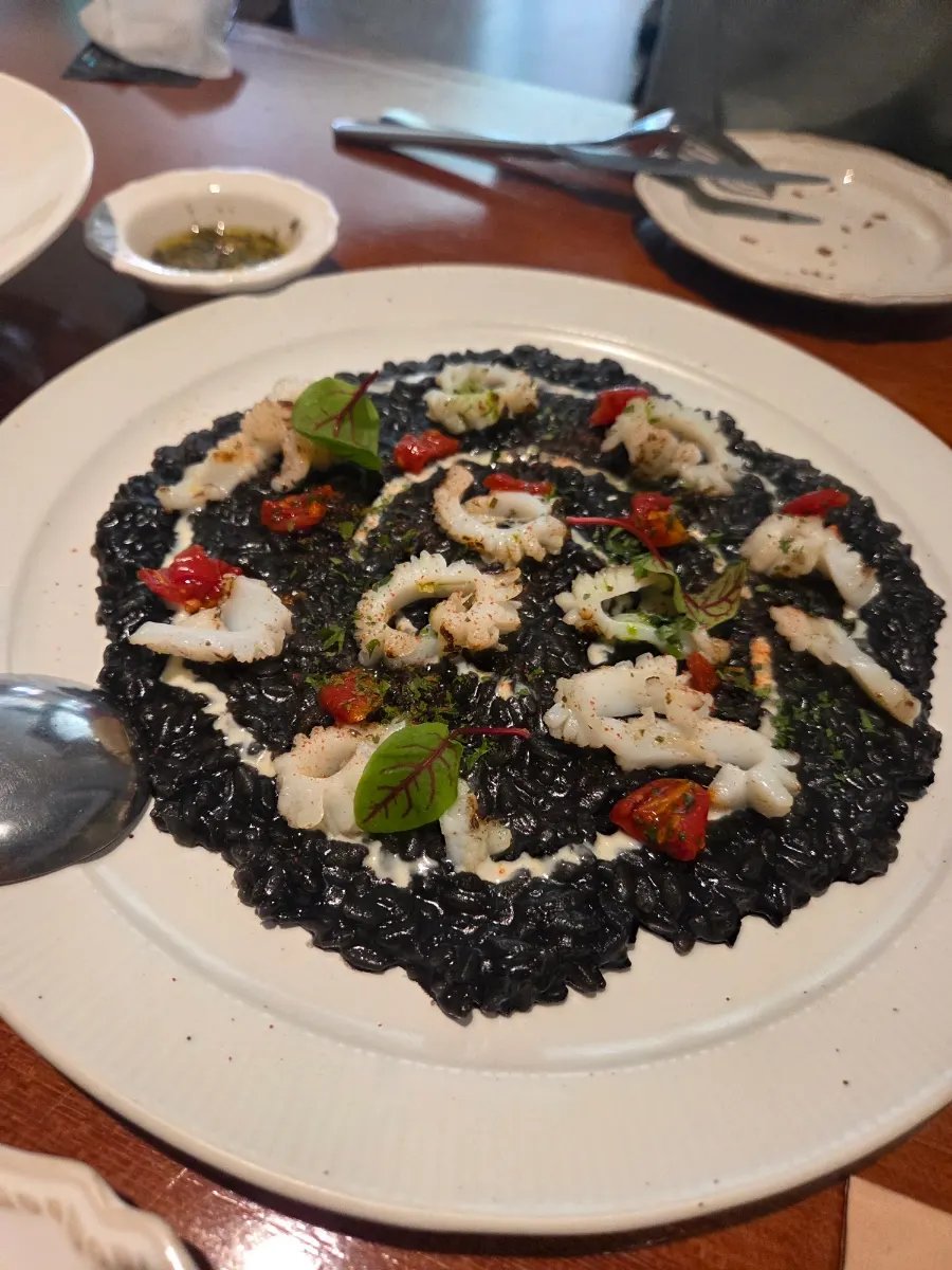 A plate of squid ink risotto