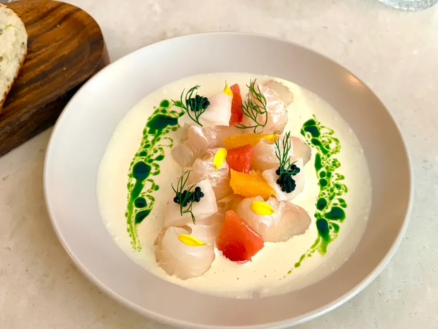 A plate of kelp-aged flounder carpaccio