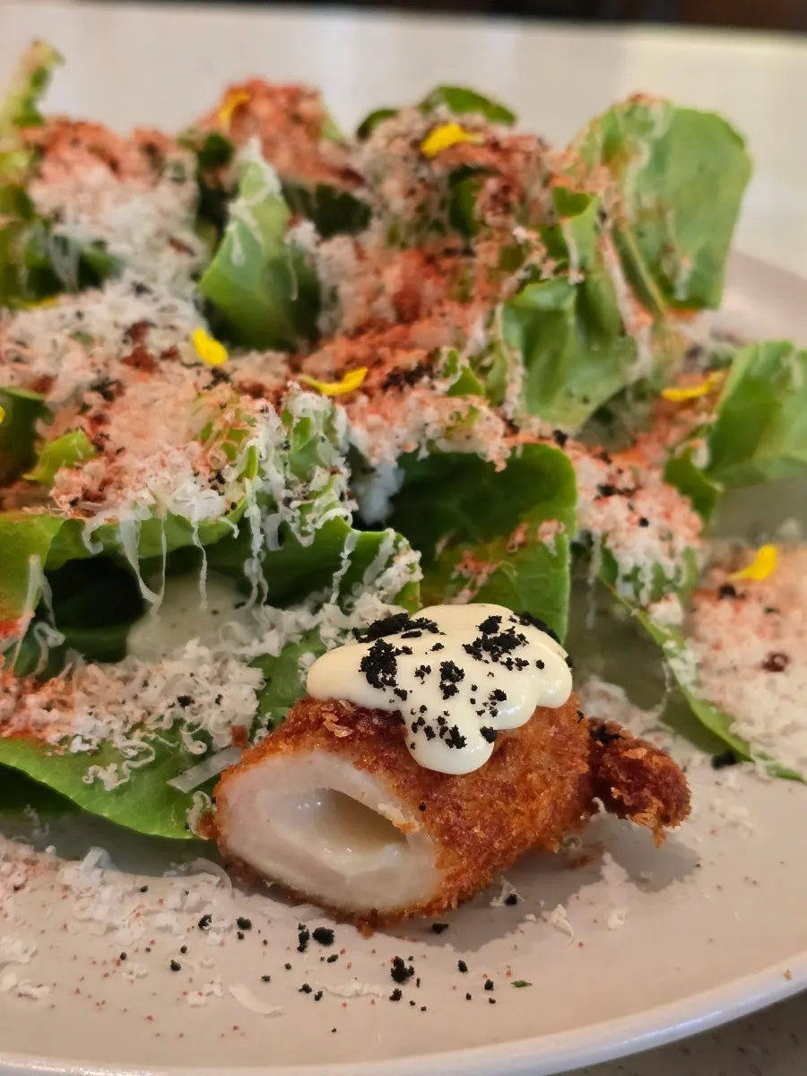 Close-up of the salad with vegetables and chicken cordon