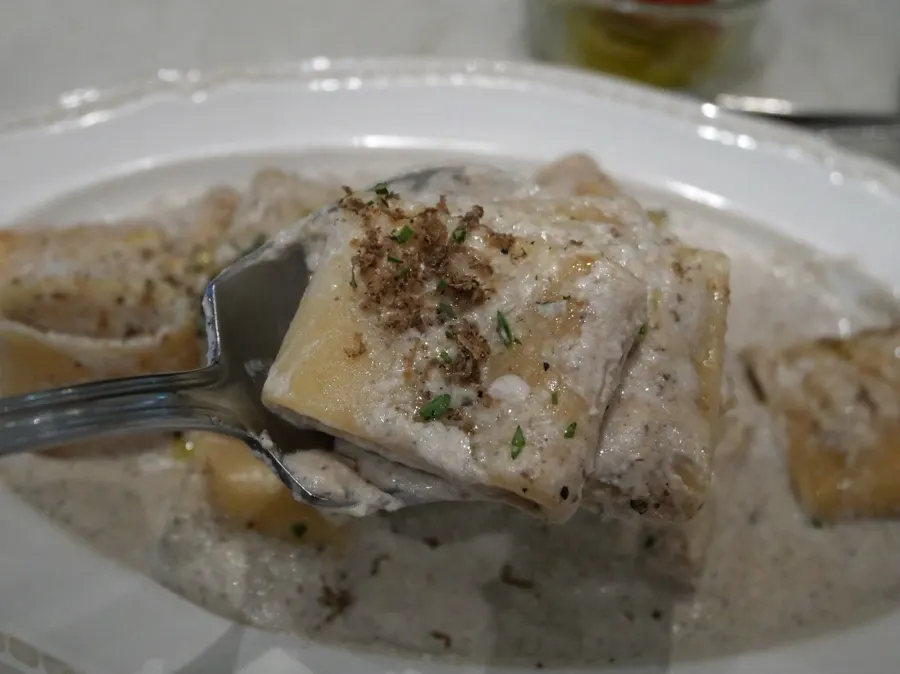 A plate of mushroom truffle cream pasta