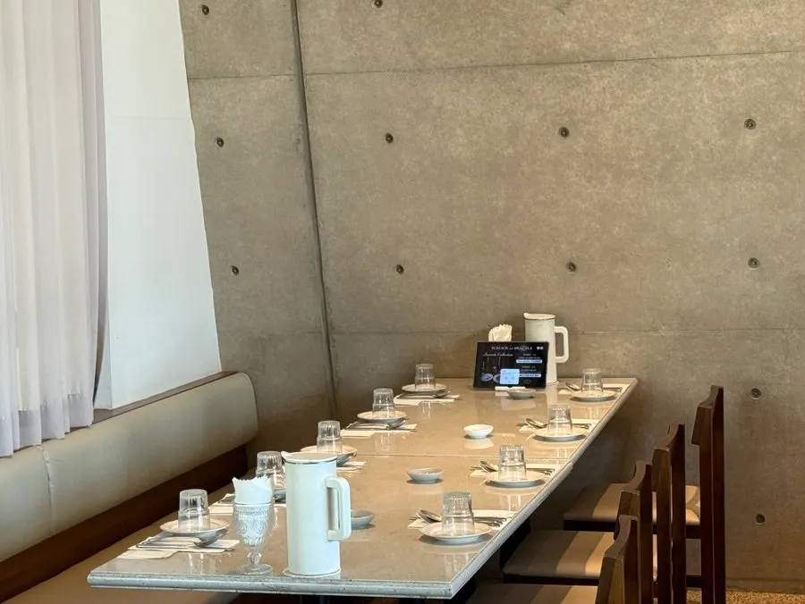 Open, airy dining hall at Romaok Magok