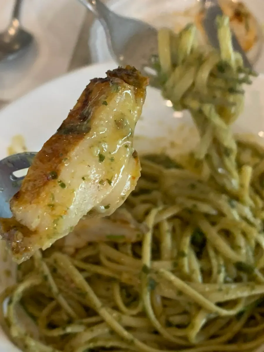 Noodles well coated in sauce in the abalone gaewoo pasta