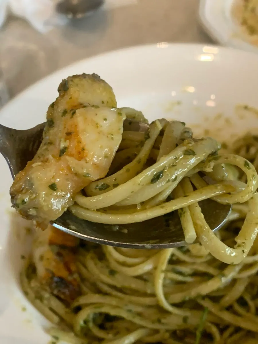 A single bite-sized portion of the abalone gaewoo pasta