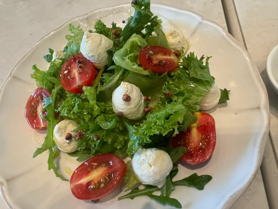 Plate of pine nut caprese salad