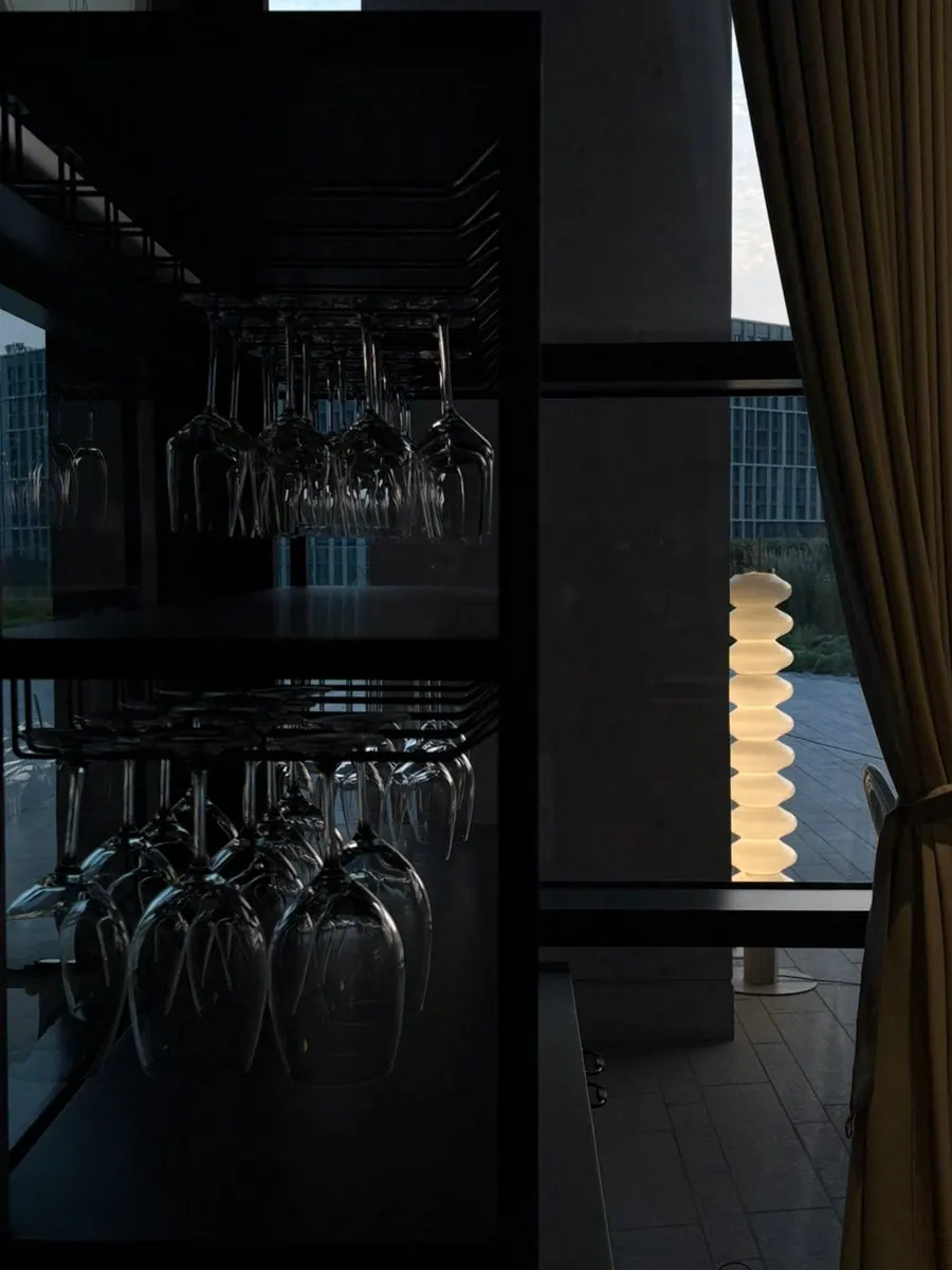 Entrance of Romaok Magok with high ceilings and orange lighting