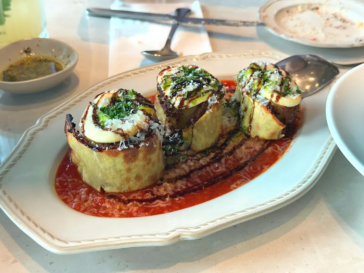 A plate of fresh lasagna roll with Korean beef ragu