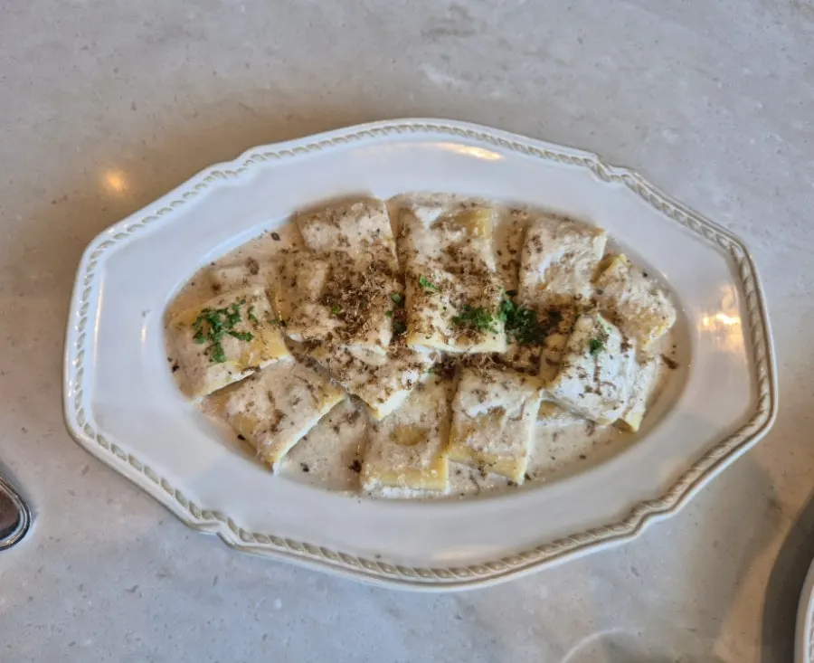 A plate of mushroom truffle cream pasta