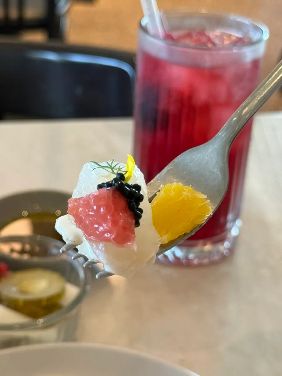 Flounder carpaccio topped with avruga caviar and orange grapefruit
