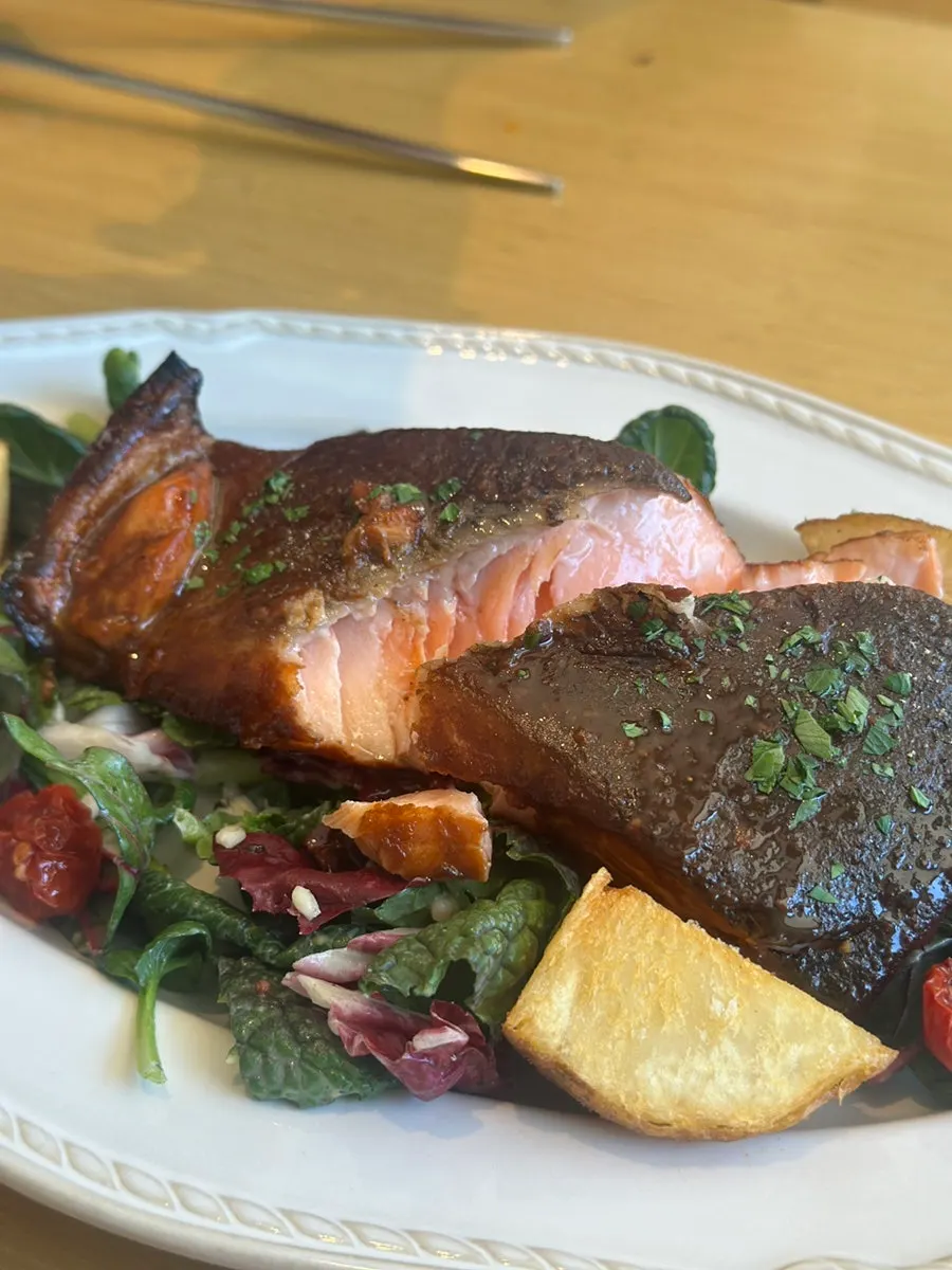 Plating of the balsamic-glazed salmon steak